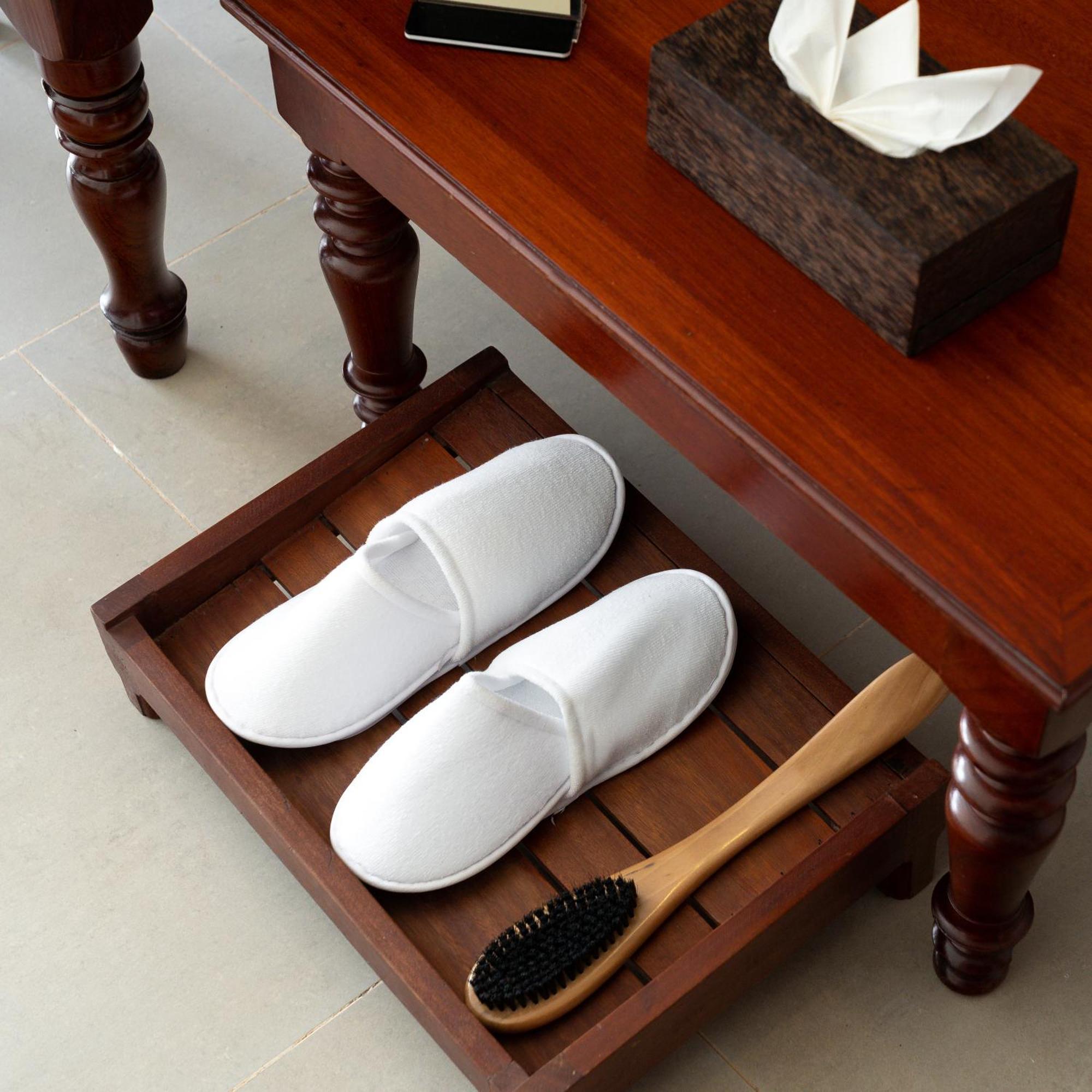 Sala Siem Reap Hotel Habitación foto A pair of hotel slippers